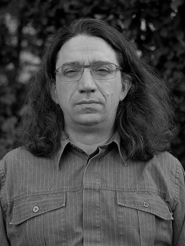 Black-and-white head shot of Yarvin